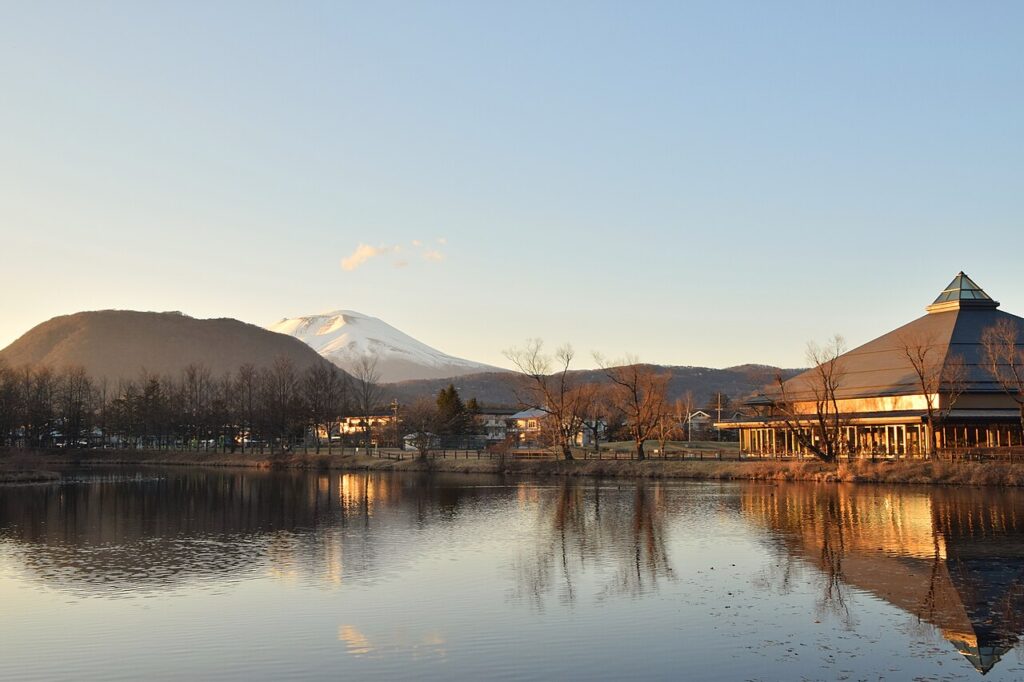Mount Asama and Karuizawa reflected in a lake in the evening