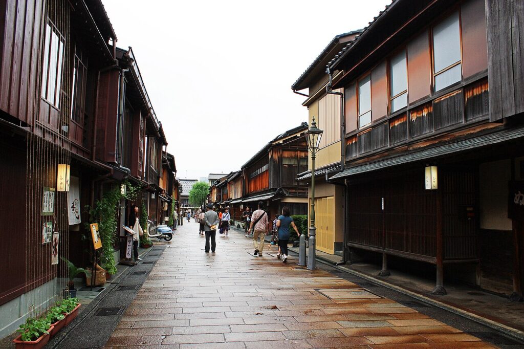 Wooden townhouses lining a stone-paved street in Higashi Chaya, Kanazawa