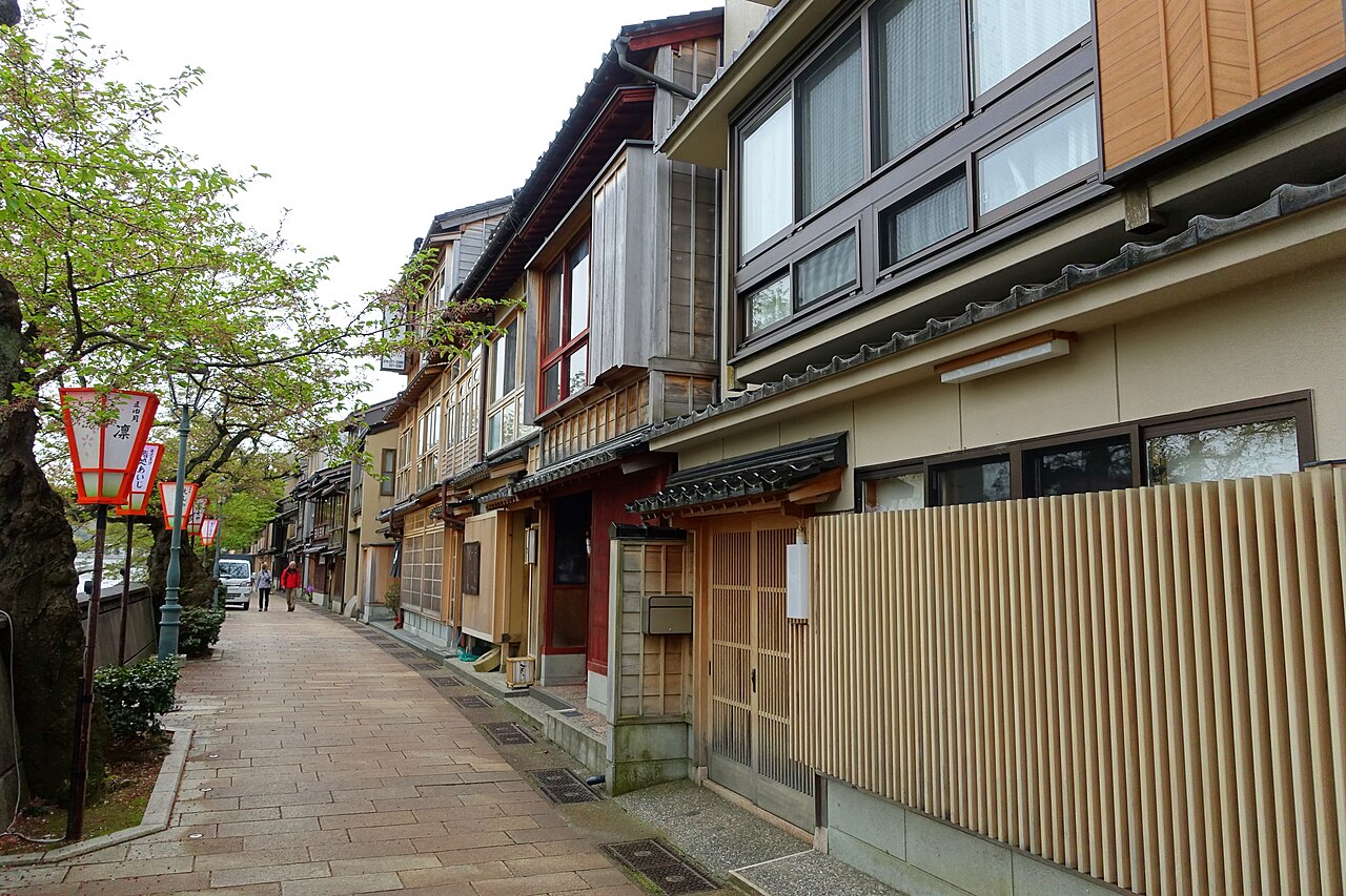 Traditional facades and lanterns along the riverside street in Kazuemachi, Kanazawa
