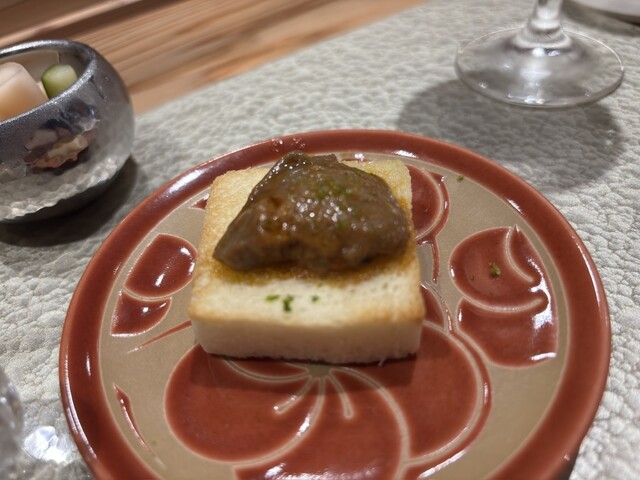 Japanese appetizer on toast at Sushi to Shuko Tomikawa