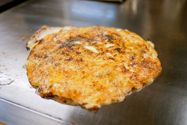 Golden cheese okonomiyaki at Tenteko Mukonoso-ten