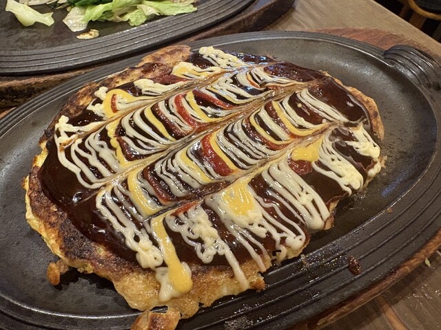 Okonomiyaki with sauce and mayonnaise at Nord
