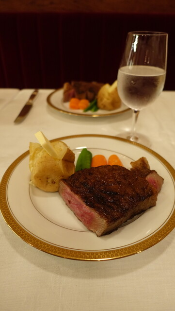 Steak served with vegetables at Aragawa