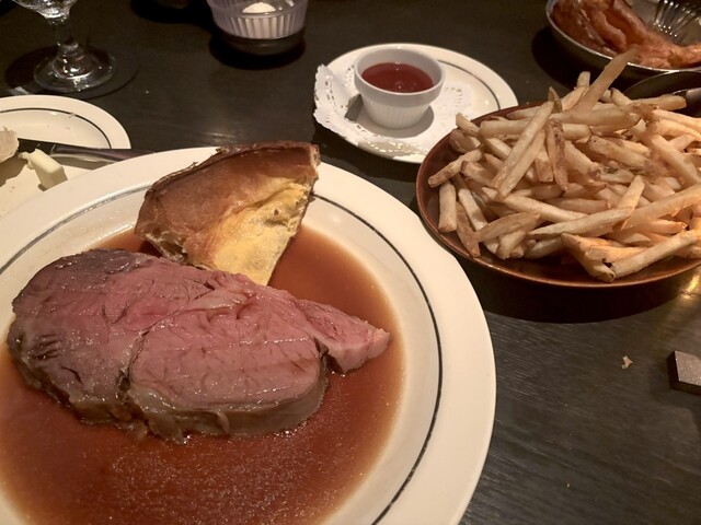Prime rib served with side dishes at Lawry's The Prime Rib, Akasaka