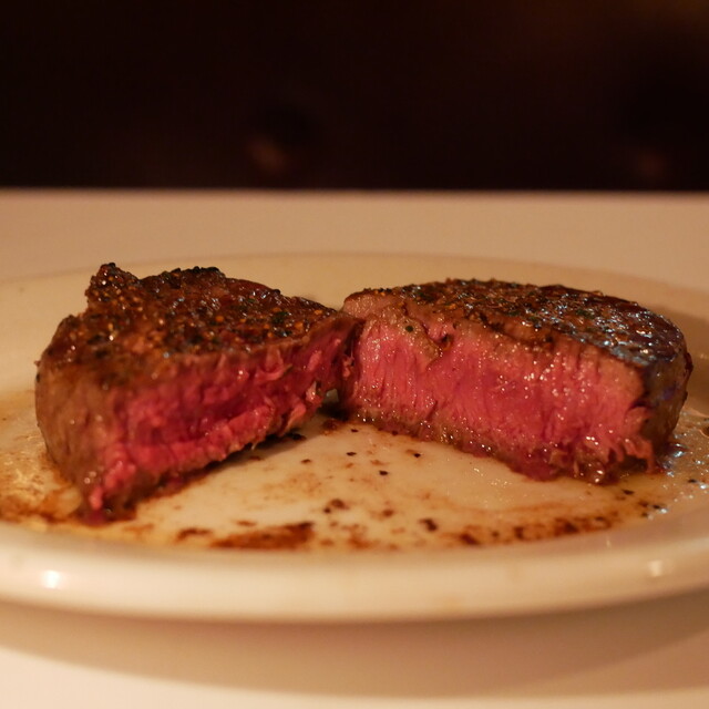 Sliced steak showing a pink center at Ruth's Chris Steak House, Toranomon