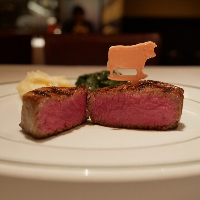 Sliced steak showing a pink center at Wolfgang’s Steakhouse Osaka