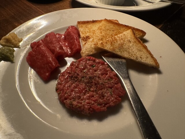 Beef tartare served with toast at CarneSio 158